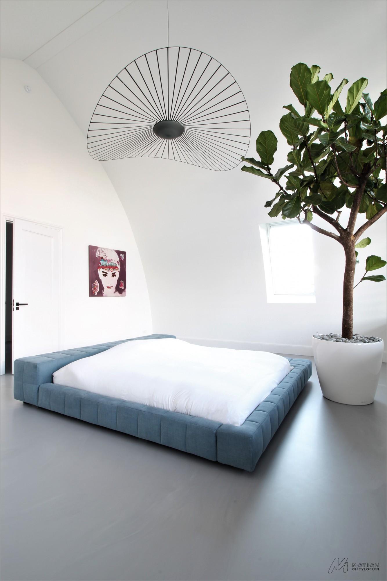 Betonlook-gietvloer-design-slaapkamer